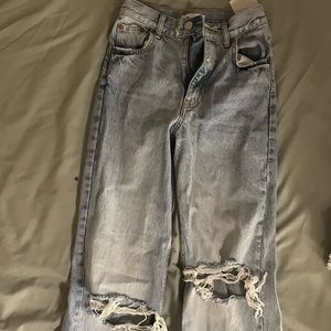 Zara flare cut pants with rips in the knees